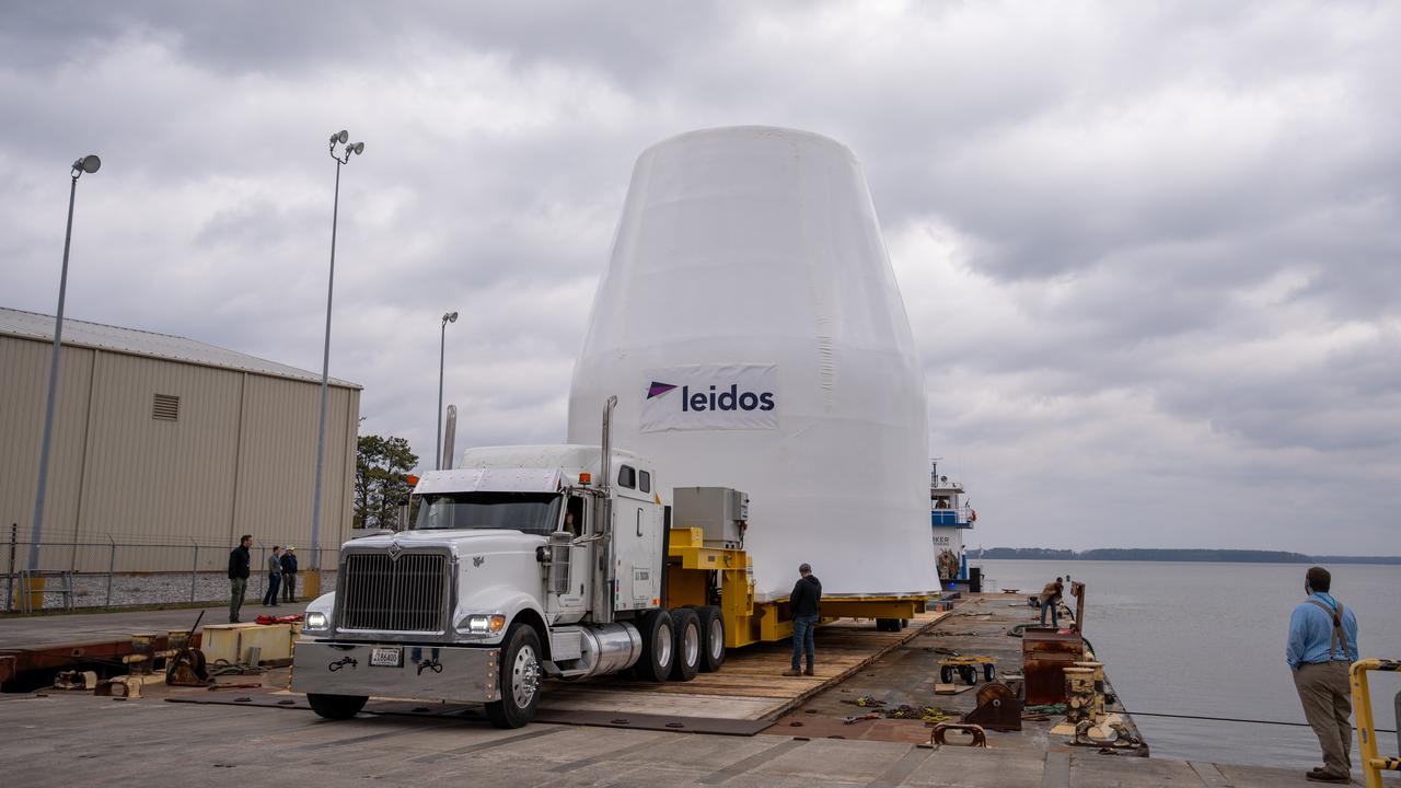 These photos and videos show how crews guided a test version of the universal stage adapter for NASA’s more powerful version of its SLS (Space Launch System) rocket to Building 4619 at the agency’s Marshall Space Flight Center in Huntsville, Alabama, Feb. 22. Built by Leidos, the lead contractor for the universal stage adapter, crews transported the hardware from a Leidos facility in Decatur, Alabama, the same day. The universal stage adapter will connect the SLS rocket’s upgraded in-space propulsion stage, called the exploration upper stage, to NASA’s Orion spacecraft as part of the evolved Block 1B configuration of the SLS rocket. It will also serve as a compartment capable of accommodating large payloads, such as modules or other exploration spacecraft. In Building 4619’s Load Test Annex High Bay at Marshall, the development test article will first undergo modal testing that will shake the hardware to validate dynamic models. Later, during ultimate load testing, force will be applied vertically and to the sides of the hardware. Unlike the flight hardware, the development test article has flaws intentionally included in its design, which will help engineers verity that the flight adapter can withstand the extreme forces it will face during launch and flight. 